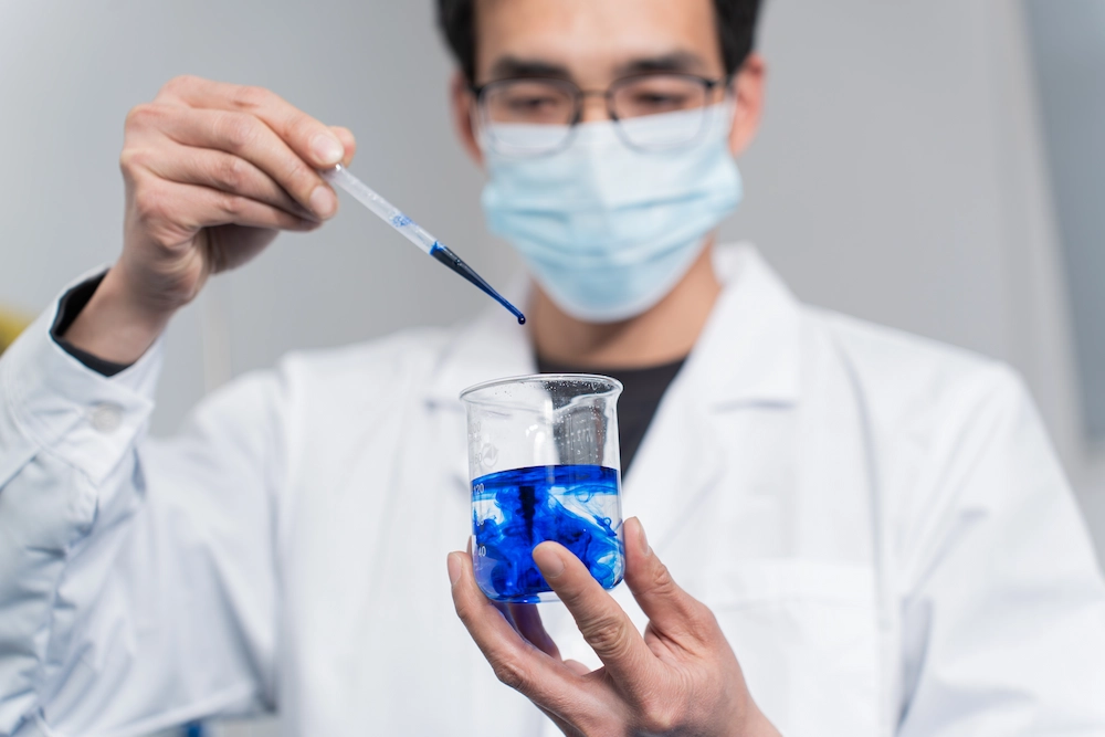 In the laboratory of P01-S08, technicians are adjusting a formula.